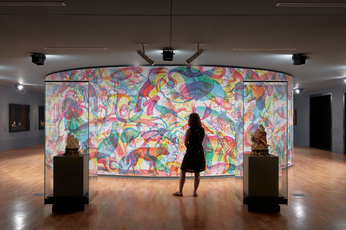 NGVMelbourne's tweet photo. Wander the halls of Carnovsky's Extinctions (2020) and witness the interactive wallpaper transform before you. Different lighting is used to hide or expose various species, based on their extinction risk level. 
#NGVTriennial https://t.co/mWDeNtKqI7