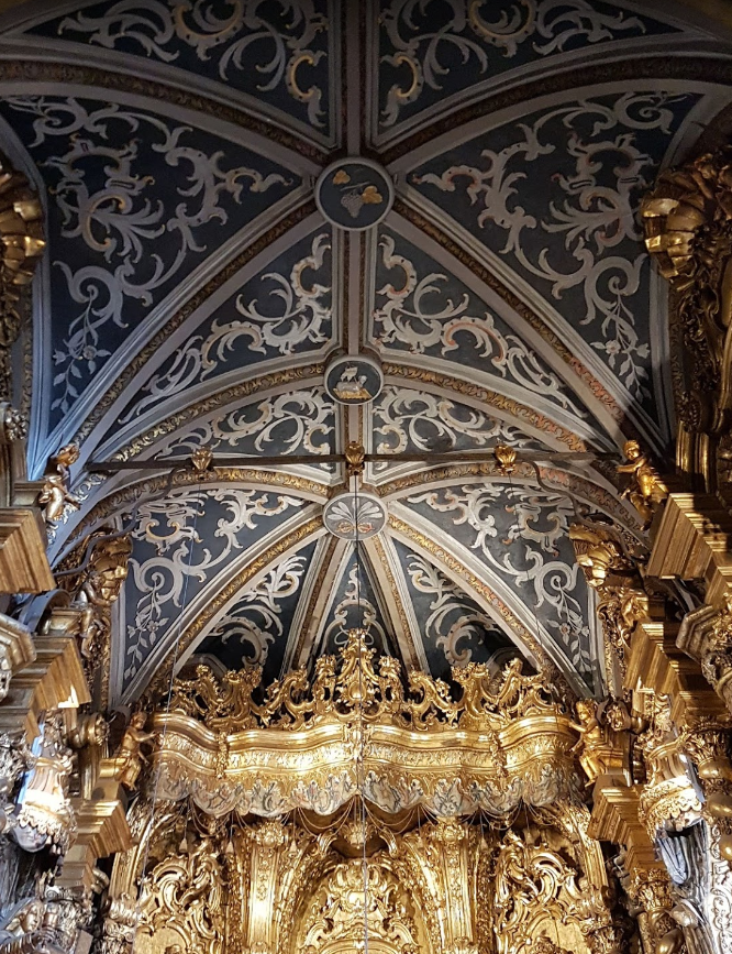  One of the most historic churches in Macaronesia is the Gothic Funchal cathedral, dating from 1493, in Madeira. Its basalt frontispiece and belfry are burnt sienna rather than black while inside the nave is lined with clustered columns. Not expense was spared on the apse.