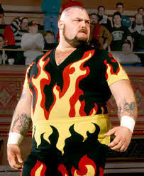 Number 22, it's Bam Bam Bigelow!His flame attire (and head tattoo) was reflected in Japan's goalkeeper shirt from the 98 World Cup!