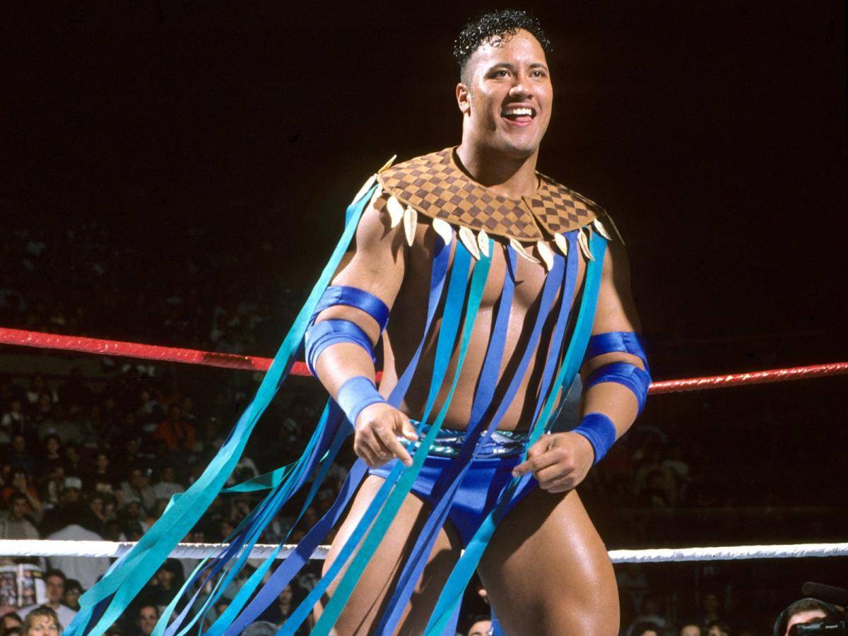 Number 28 is Rocky Maivia!This rookie's brown and blue attire was reflected in Porto's away shirt from 2015/16!Wonder whatever happened to that Rocky kid?...