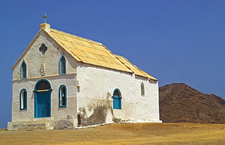  Virtually in the middle of nowhere, the church of Pedro de Lume in Sal island is like something out of a Mad Max movie. Rusting industrial equipment, salt flats and dusty volcanic landscapes and a fishing harbour add to its eerie attraction. Inside, it’s very basic.