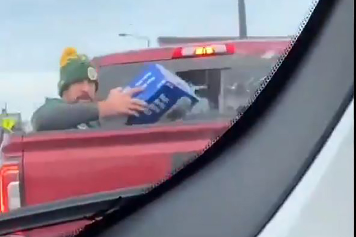 Aaron Rodgers 'That was me' in back of pickup truck with case of beer