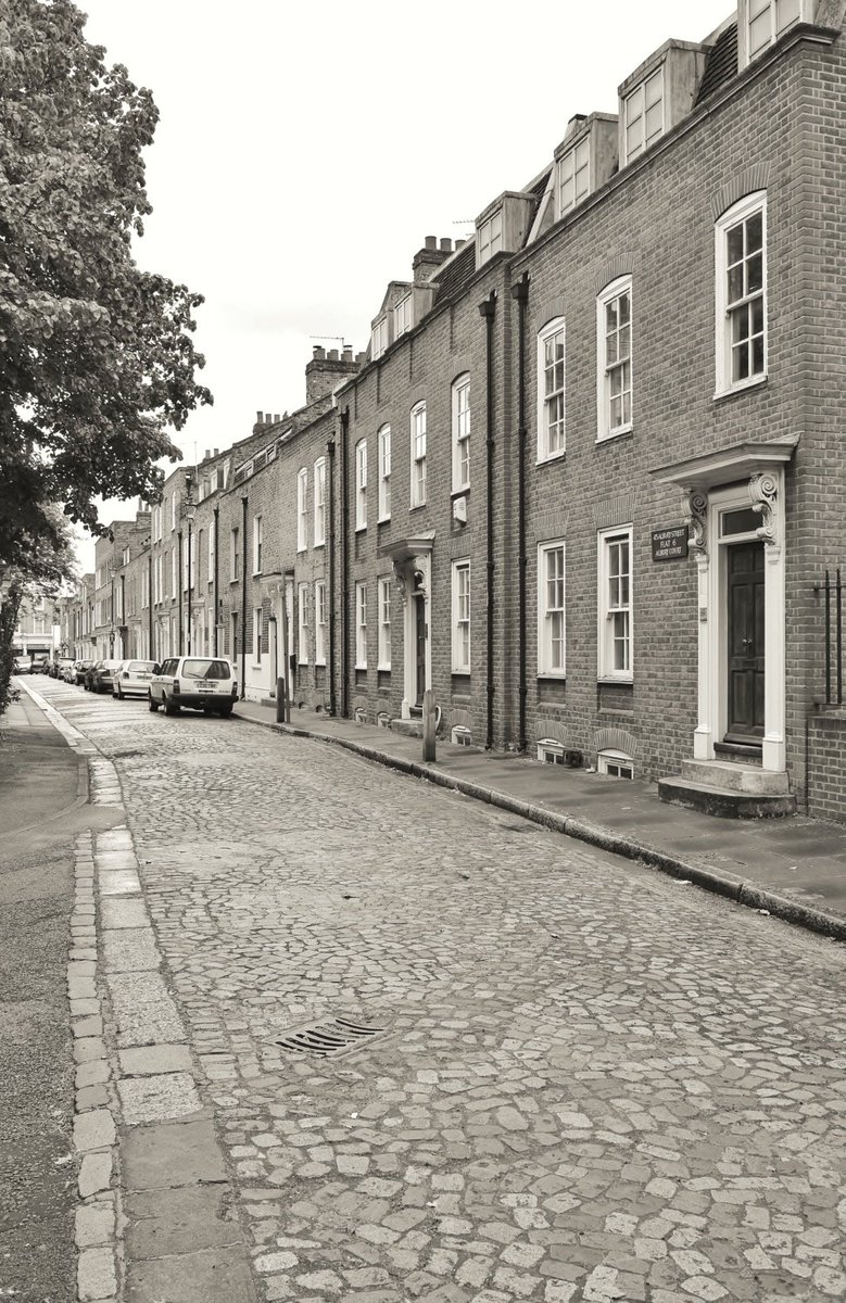 Number 150 Deptford high Street still standing with the bombed space next to it on the left and the rebuilt house on the rightOld photos of Albury Street