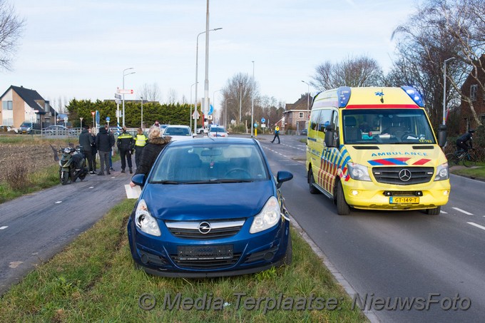 Aanrijding tussen auto en scooter..