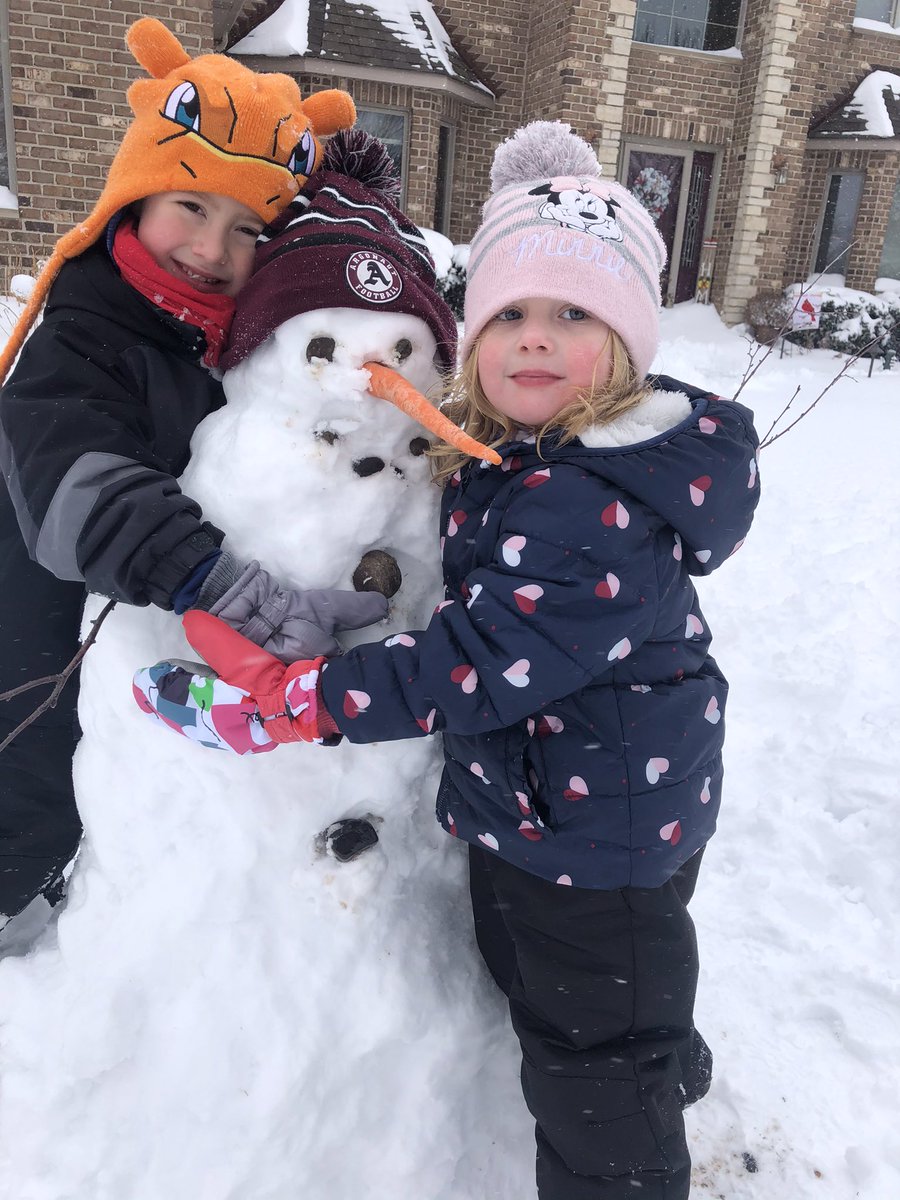 Argonauts217's tweet photo. While I was shoveling, James and Emmerson decided to make a snowman sporting an Argo Football hat. @FootballArgo #argopride https://t.co/QbQ4Cu8OqQ