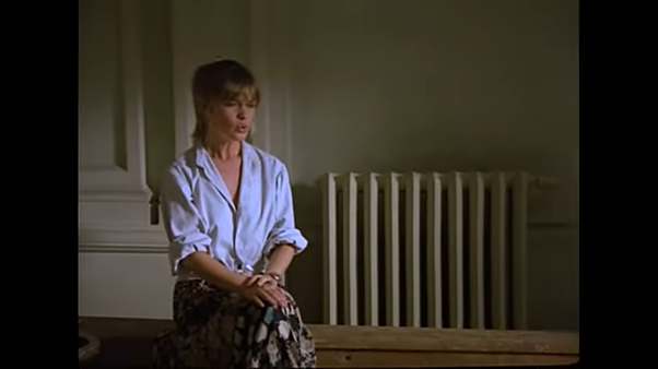 And then the scene changes. This lady is singing a sad lament (possibly because she’s too hot - that is a massive radiator) …