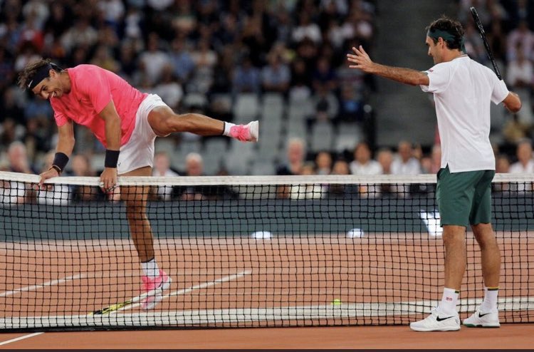 After winning a set a-piece, Roger took the deciding set 6-3 when Rafa’s return ball hit the net and also got himself a Rafa-shaped trophy when his opponent vaulted the net for a hug...