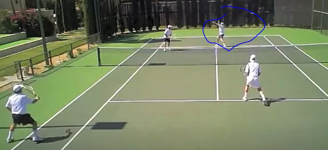 Here are two screenshots of this actually happening, not at the guy's eyes, but the guy slammed the ball right at him. On left, you can see guy setting up for a slam. On right, the aftermath, where he hit it so hard the guy on right is off balance just trying to protect himself.