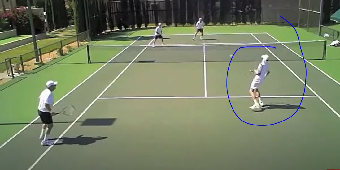 Here are two screenshots of this actually happening, not at the guy's eyes, but the guy slammed the ball right at him. On left, you can see guy setting up for a slam. On right, the aftermath, where he hit it so hard the guy on right is off balance just trying to protect himself.