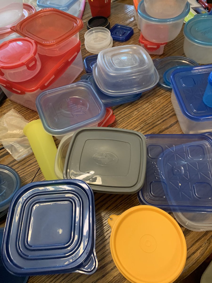 Going through the storage container cabinet again. I did this last year and got rid of a bunch. I wonder if we can get this down to one shelf #declutter50percent