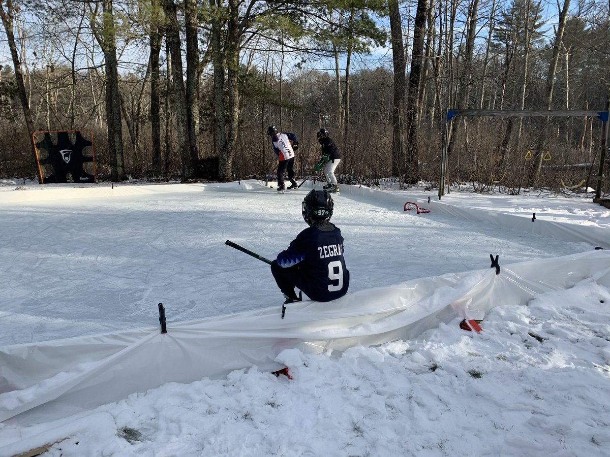 flutie22's tweet photo. Perfect day on the outdoor rink with teammates and neighbors @Buccigross https://t.co/iDbVwR8N6I