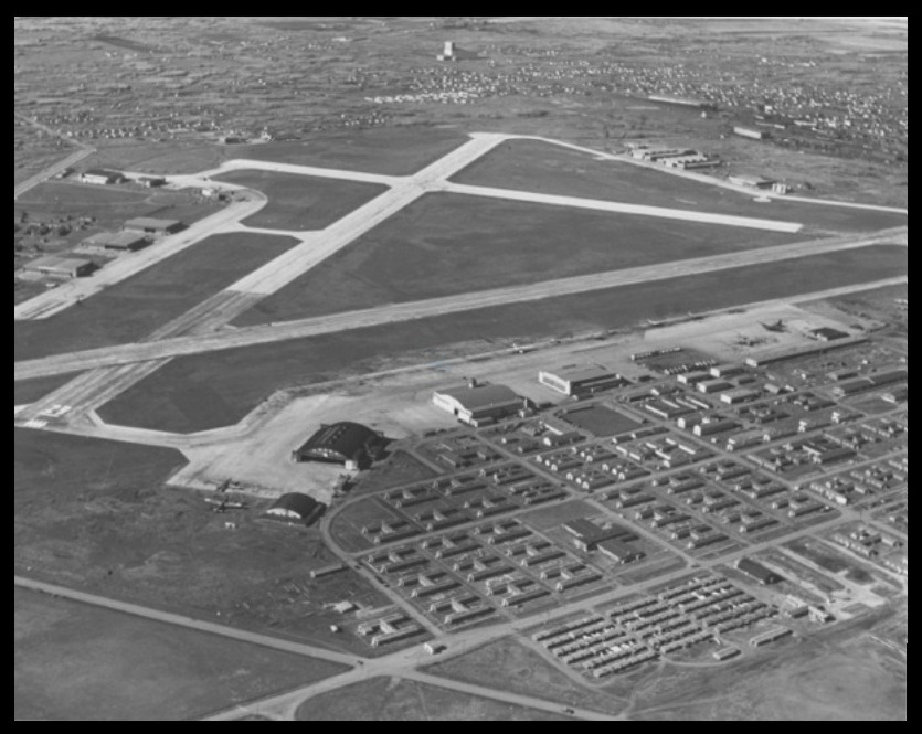 Built in 1942, Hangar 11 (aka T3) is one of only two remaining Second World War-era hangars. Construction of the hangar began that summer. • Hangar 11 (centre) looking N/W. The army barracks (lower-right) are now occupied by the  @NAIT Campus