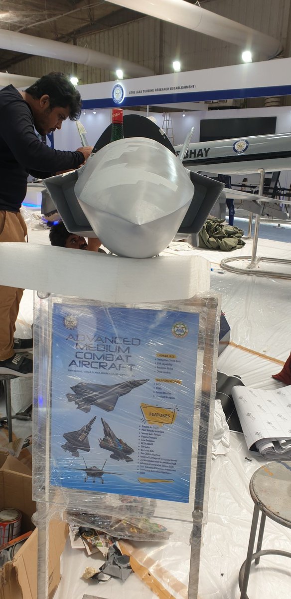 ReviewVayu's tweet photo. AMCA model being assembled....can see some new design features. Lets wait for tomorrow to see it in its full glory.
Meanwhile, do notice the booze bottle in the cockpit 🤠🥃🥃✌ https://t.co/QC38ILMcQC