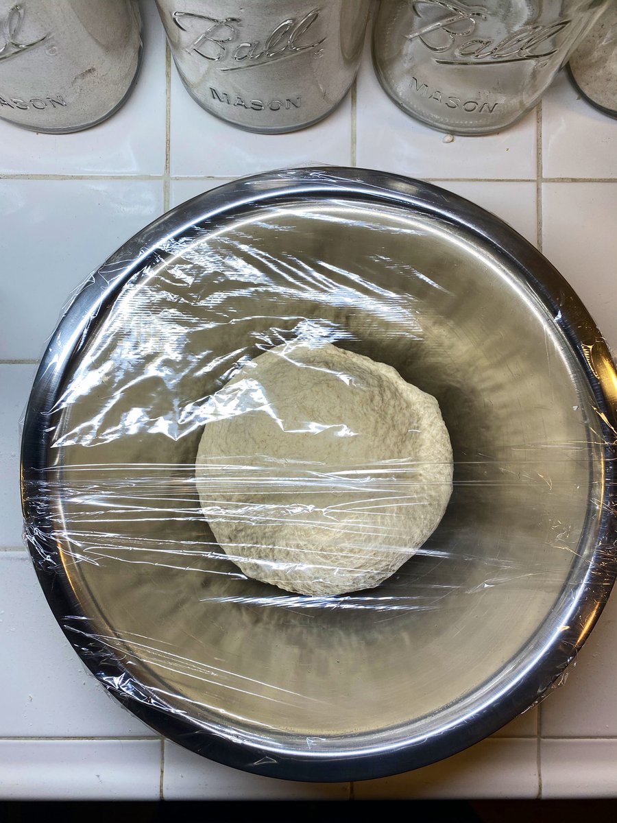 I generally hate plastic wrap, but it helps here to see everything. Cover the bowl airtight in a more responsible way than this. Put it in the fridge. Have a glass of nice Côtes du Rhône. The dough will refrigerate for 12-24 hours, and no less. So relax! The easy part is done.