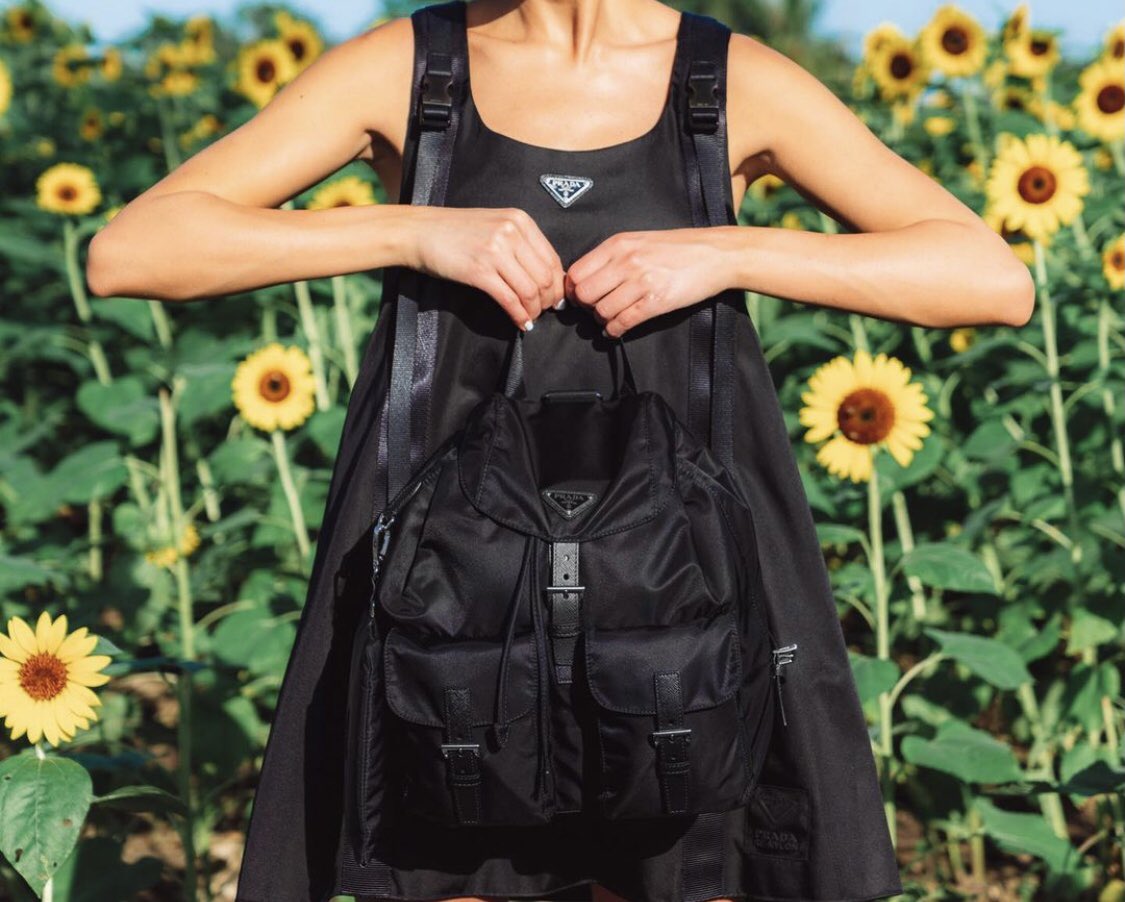 _FashionCouncil's tweet photo. The @Prada Re-Nylon Collection 🖤 ‘Reflecting changing times and a shifting world, Prada launches a pioneering new project, Re-Nylon, introducing a sustainable line of Iconic Prada bag silhouettes executed in a unique new regenerated nylon, ECONYL’ 
#prada #PradaReNylon https://t.co/Fq8V5FY7FL