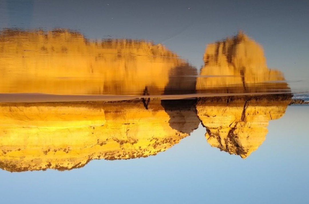 Viewed upside-down, the local beach on a calm morning a while back #Modaymotivation #Algarve #Portugal 🇵🇹 #travel #photography