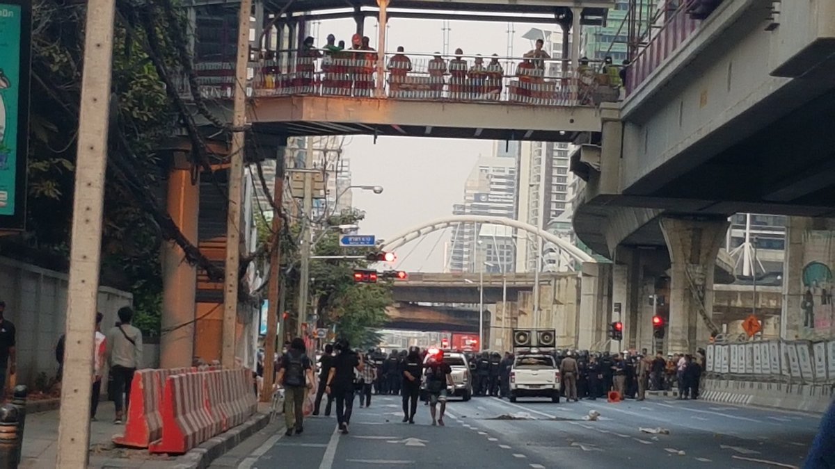 MayWongST's tweet photo. A peaceful protest by #Myanmat citizens living in #Bangkok #Thailand to reject #militarycoup in own country has turned south as #Thai anti-government protesters gathered clashed with police #รัฐประหาร https://t.co/jSCo1OZg7b