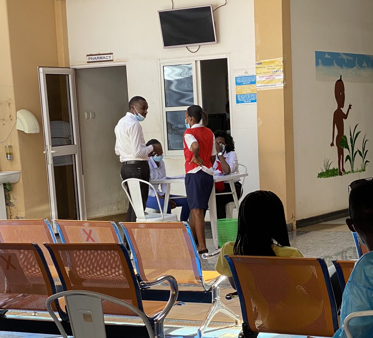 jboiles's tweet photo. @BahoIntHospital This guy had his face mask down the whole time I was here getting COVID tested. @Rwandapolice Medical professionals should know better. https://t.co/lLiufUGNzq