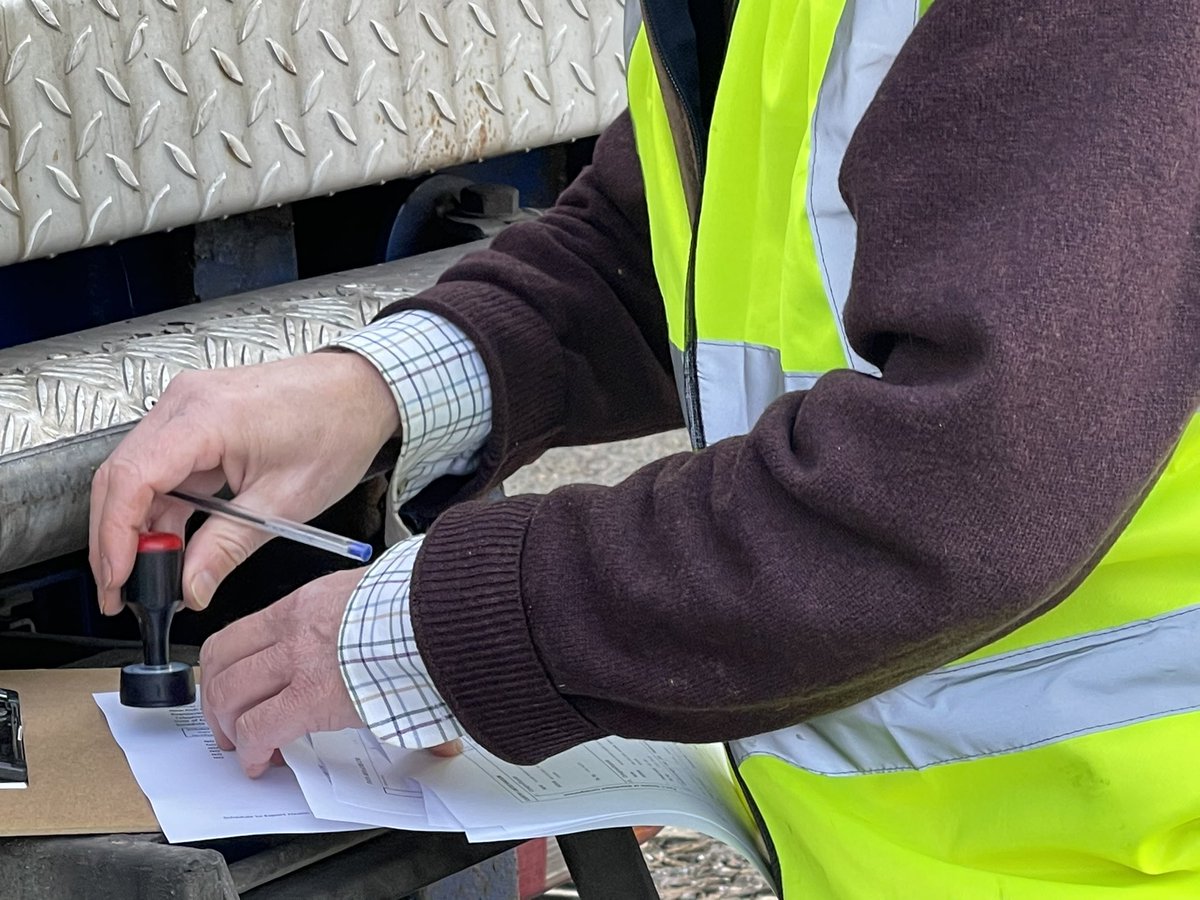 big one - newly compulsory Export Health Certificate - here being granted by visiting vet inspecting the fish (also required for many other foodstuffs) stamping every page and box, in English and French and sealing the lorry -which was then subsequently held at Dunkirk for 15 hrs