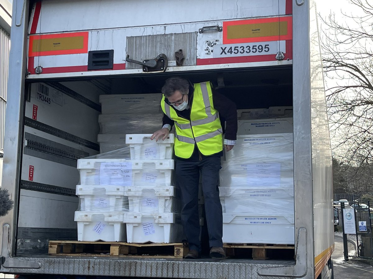 big one - newly compulsory Export Health Certificate - here being granted by visiting vet inspecting the fish (also required for many other foodstuffs) stamping every page and box, in English and French and sealing the lorry -which was then subsequently held at Dunkirk for 15 hrs