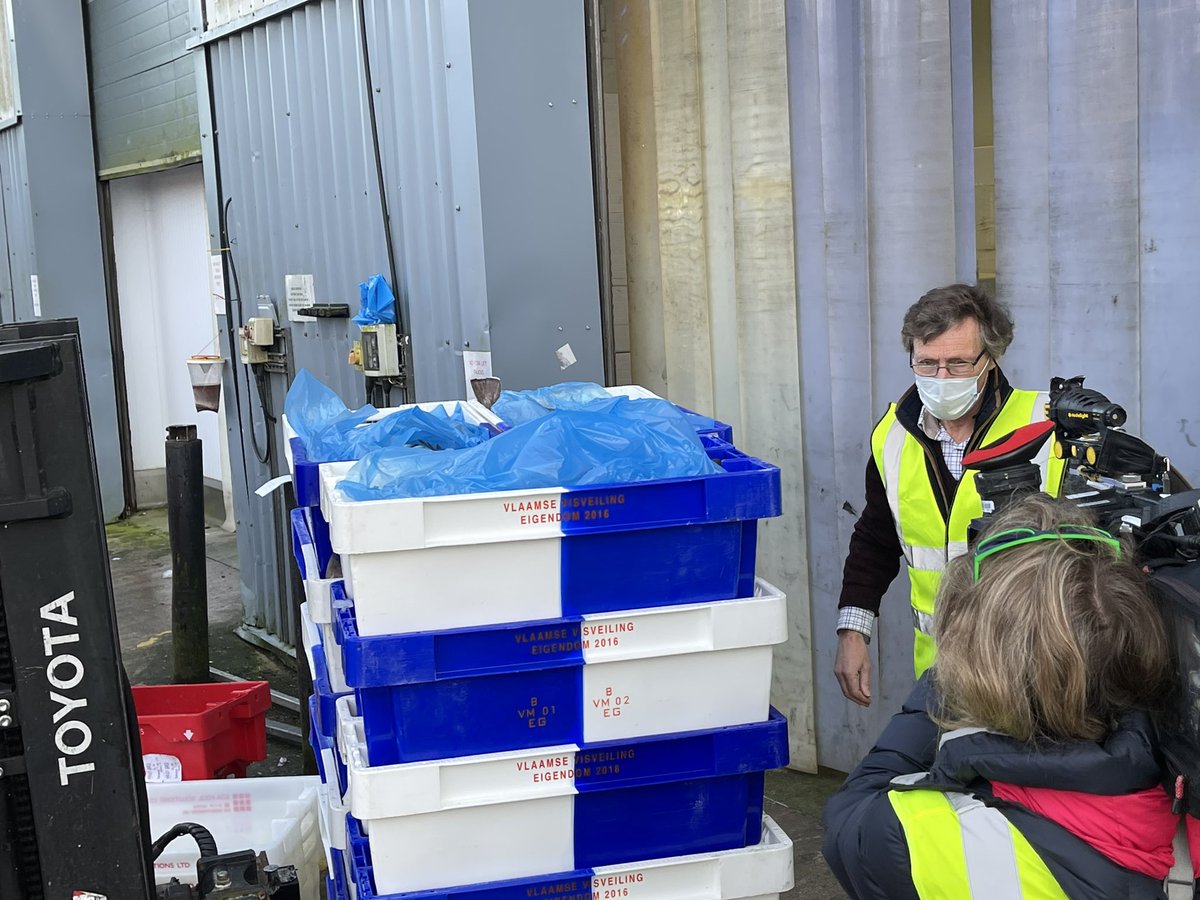 big one - newly compulsory Export Health Certificate - here being granted by visiting vet inspecting the fish (also required for many other foodstuffs) stamping every page and box, in English and French and sealing the lorry -which was then subsequently held at Dunkirk for 15 hrs