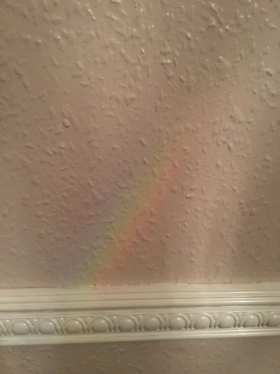 jay_abdin's tweet photo. Not sure how but there seems to be a rainbow projected on my wall. The photos are with and without camera flash. #littlethings https://t.co/3ARsVZXu7N