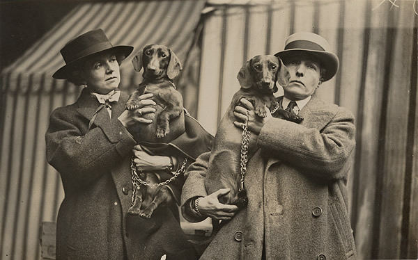 As well as being a superb writer of various genres including comedy and poetry, Hall maintained a strong Catholic faith, successfully managing to square her religion with her sexuality. She also loved dogs - here she is at Crufts with her dachshunds!  #LGBTHM21  