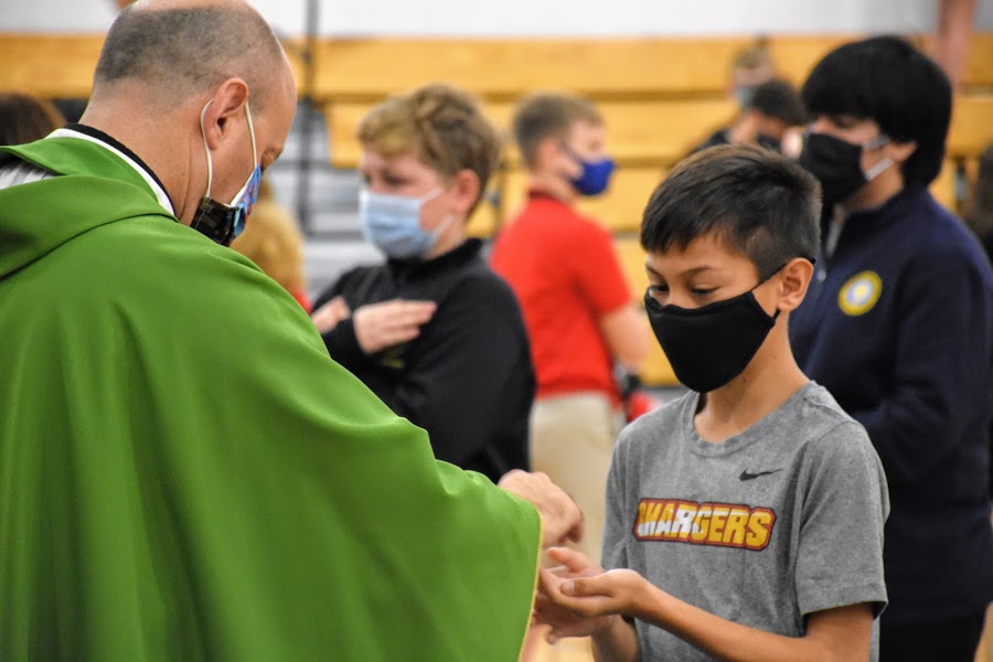 StMarthaCS's tweet photo. #CSW21 Community. MS students attended Mass, following safety protocols, with Celebrant, Fr. John Belmonte, S.J., Superintendent. Students & staff wore shirts of favorite orgs., & we collected food & clothing for Booker Elem. & food pantries! #StrengthInFaith #CharacterInService https://t.co/6xEWyiod34