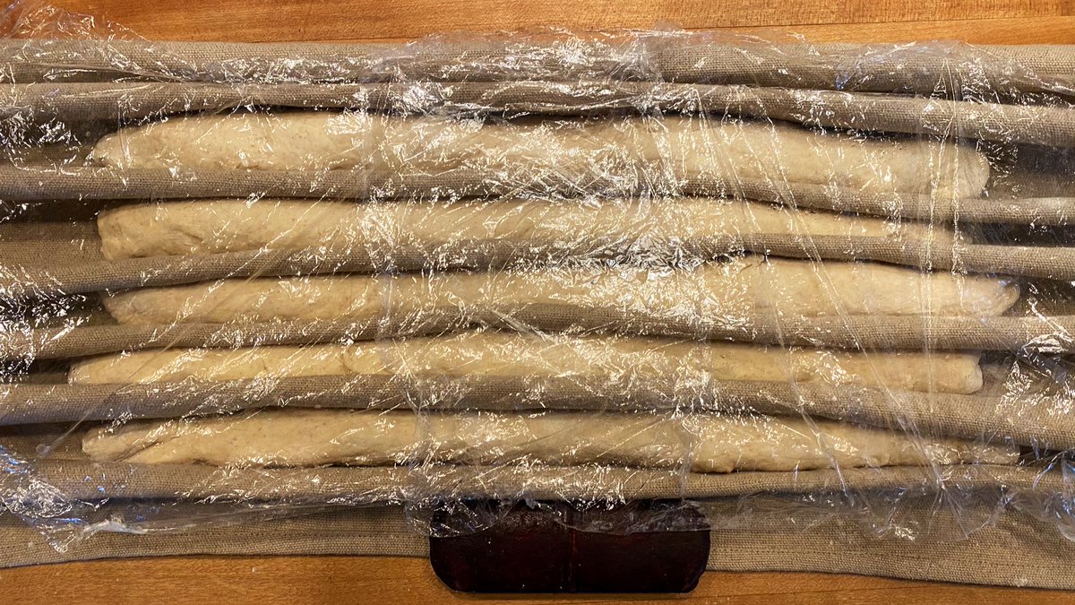 Cover the couche with the guilt-relieving recycled plastic. Set a timer for 1:20. Turn your oven on ALL THE WAY UP. We’d like 290C; most home ovens struggle to get to 270C so give it the whole 1:20. A baking stone really helps. Also, you will need a jelly roll tray in the bottom.