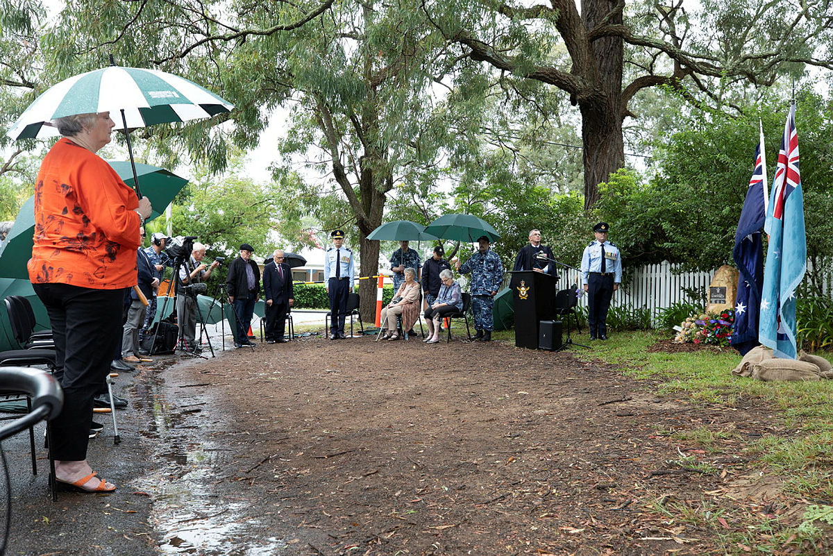 In choosing photos from the re-dedication service in Glenbrook last week, we deliberately selected this one. While it might be judged for having too much negative space, the brown soil on the roadside almost appears like a scar that hasn't quite healed, eight decades on.