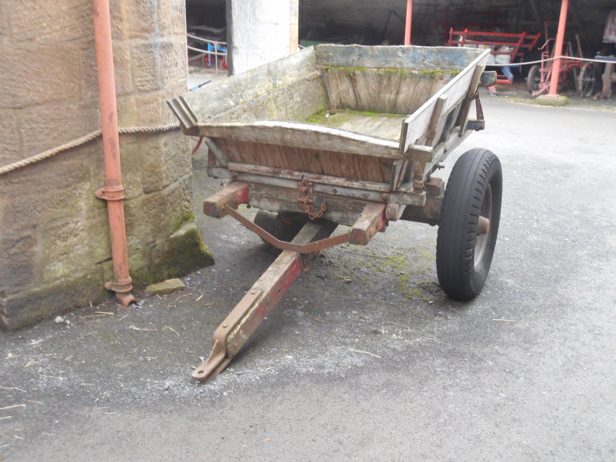 Spot the difference? Pneumatic tyres (probably from a scrapped pre-war car) and the shafts replaced with a towbar for use with a tractor. Because a tractor can pull more than a pony the farmer has added 'greedy boards' to get the capacity up 12/n