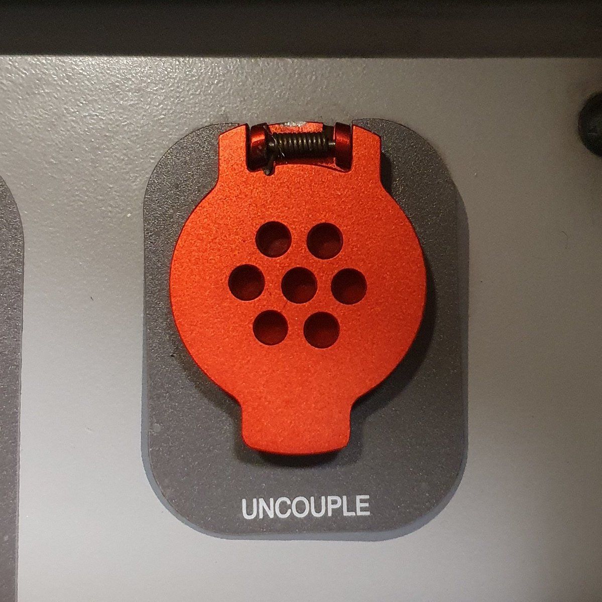  The next instruction is "Press and hold the uncouple button, and make a safety announcement." The uncouple button is a red button protected with a flap to prevent accidental operation. &ndash; bei  Horsham Railway Station (HRH)