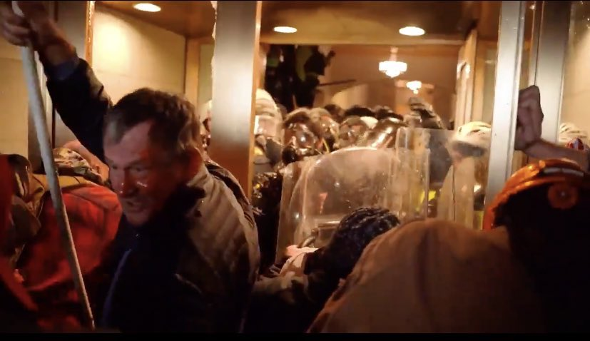 <a href="/joncoopertweets/">Jon Cooper 🇺🇸</a> I see.
Rep matt gaetz staff incited the crowd to the point were they killed US capitol Police officers or beat them to near death like this gentleman who's face may be covered in the blood of a US capitol office he just beat repeatedly with that metal pipe.
He still walks free.