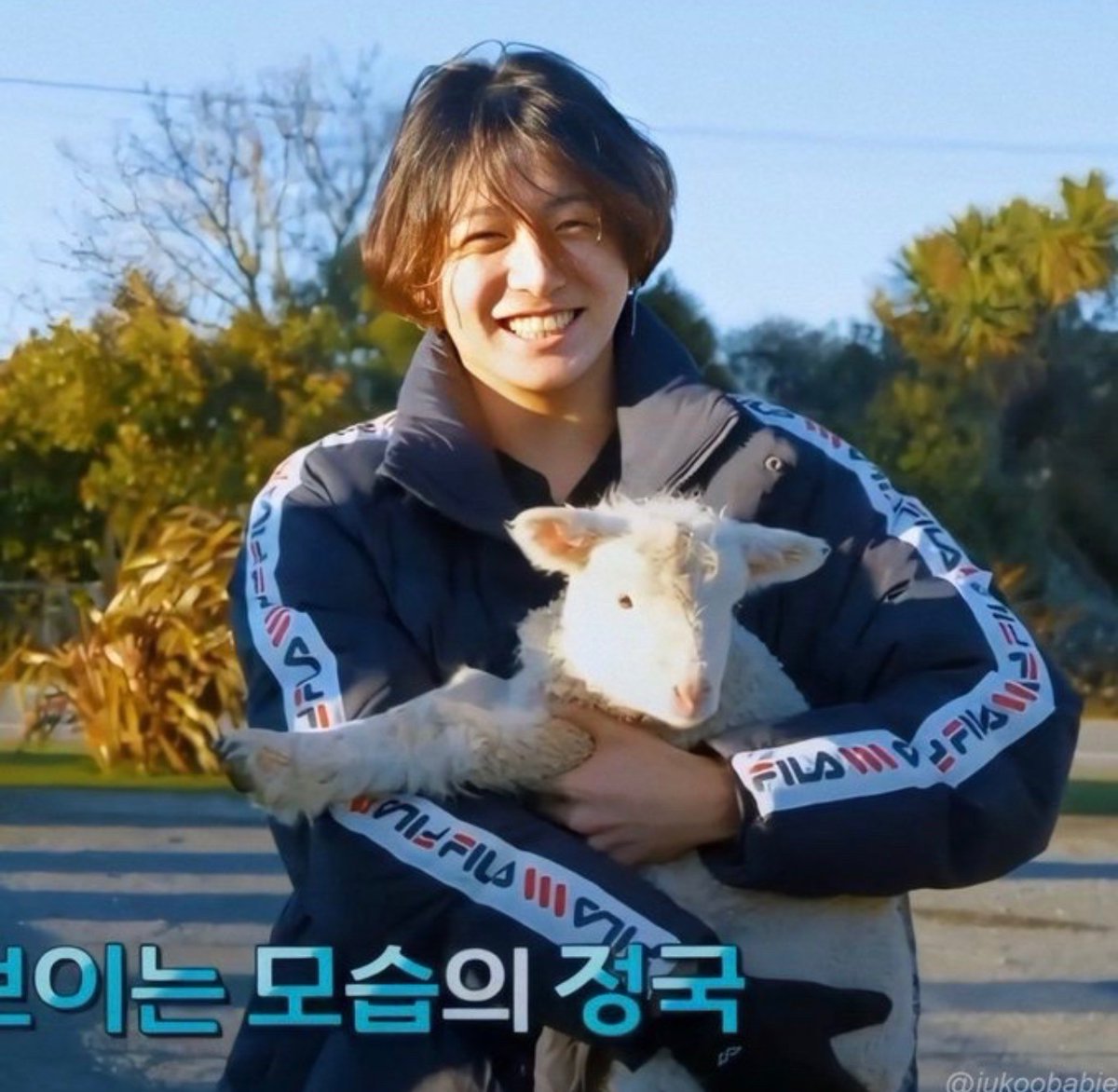 he was so excited to hold the lamb 