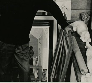 Jacob Lawrence, The Studio, 1977 (gouache,  @iheartSAM). Here's Lawrence's self-portrait: working in his Seattle studio, with Harlem out the window. In the 1983 photo, he's standing in front of the finished painting. The Studio in the studio!  http://art.seattleartmuseum.org/objects/10605/the-studio