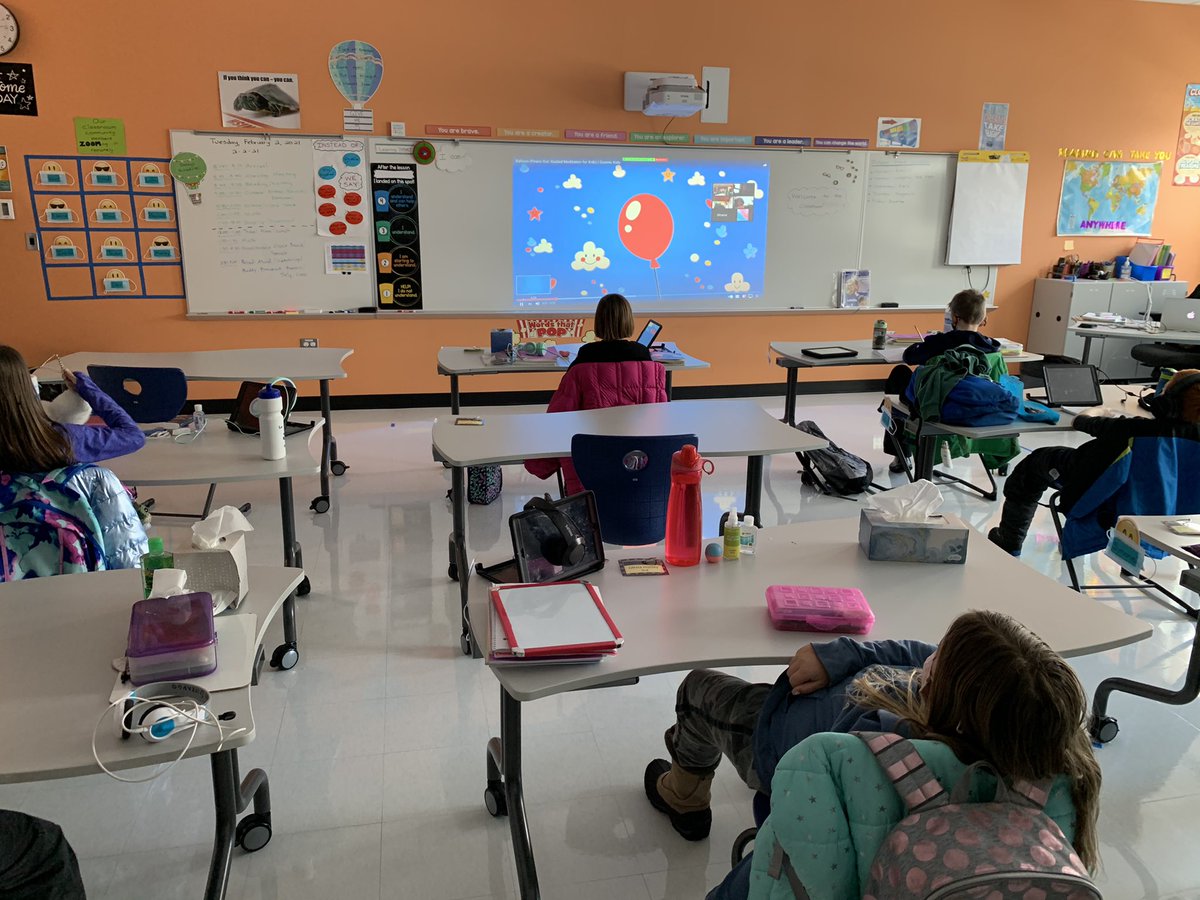 Hybrid Day 1:Utilizing many screens so in-person kids see/hear remote kids &amp; remote kids see/hear into our room; In person kids collaborate from a distance while remote kids use breakout rooms; we all pause for a guided meditation brain break #oakpark97 #longfellowbears #WeAreD97