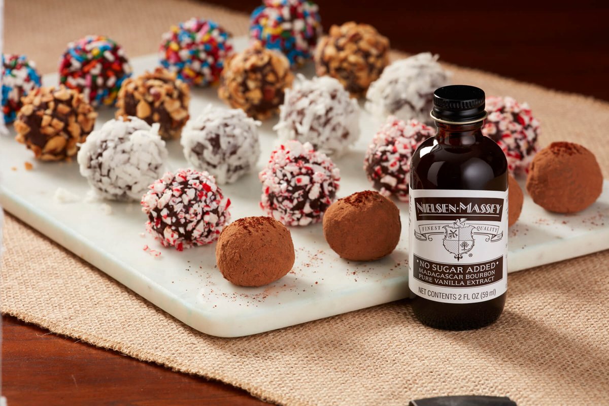 NielsenMassey's tweet photo. Our 4-ingredient Chocolate Truffles are simple, quick and make the ideal chocolate fix. Comment and tag a chocolate lover below, or head to our link below to make these tasty treats for yourself. https://t.co/a2sGtY5xwZ #BakeforYou #NielsenMasseyInspires https://t.co/M5w7KvUpMX