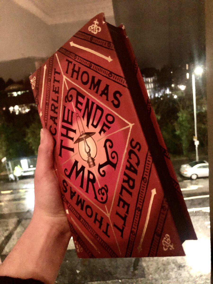 The first was  @scarthomas’ The End of Mr Y. It was a stunning hardback with black sprayed edged pages and a deep red cover, and the contents were just as exciting: a mind-twisting adventure story about a cursed book, a hidden dimension, and a mouse-god named Apollo.