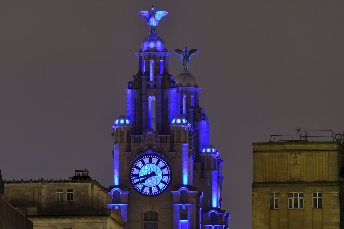 Liver Buildings lit up blue in honour of #CaptainSirTomMoore  this evening