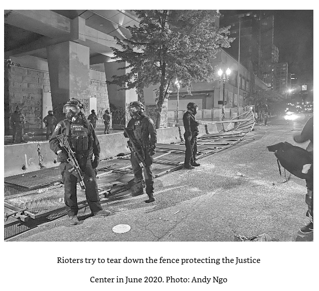 Ngo's captions continue to be extremely on point, as he describes a picture of feds standing in front of a destroyed fence as Antifa "trying to tear down" a fenceThere's no try here, Andy, they tore that shit downI don't know who your editor is but fire them immediately