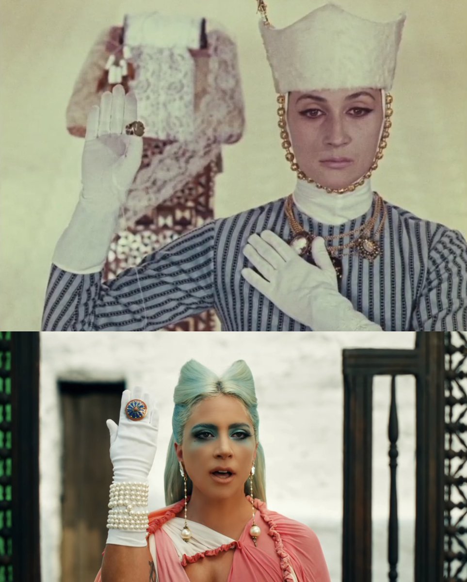 the ‘young poet’ and his lover are both played by Sofiko Chiaureli, notice the white gloves and jewellery