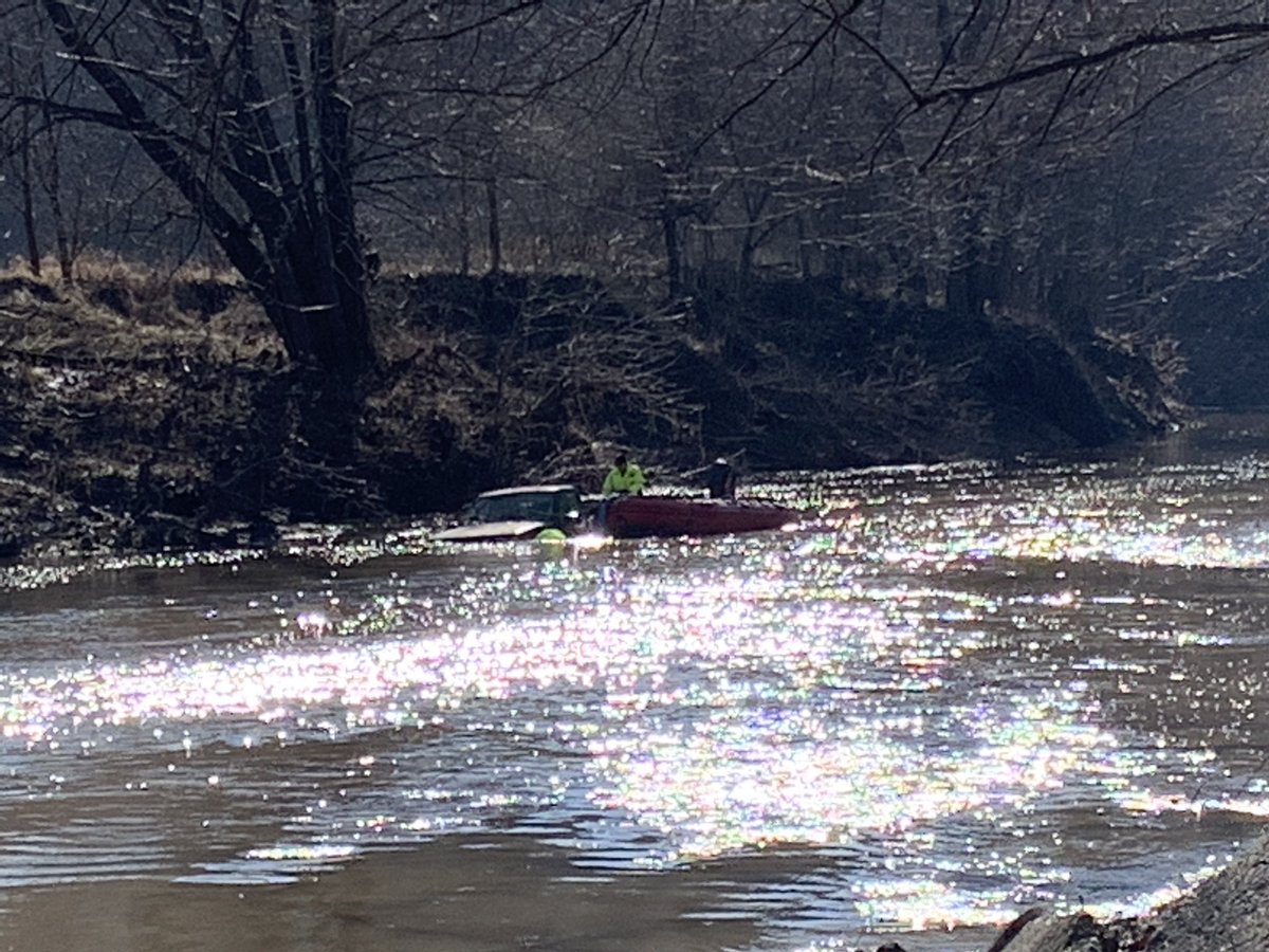 MSHPTrooperF's tweet photo. Corporal Borgmeyer and Trooper O’Brien are working hard fishing the truck out of North Moreau Creek this morning. This is the same vehicle mentioned a couple of days ago that tried to drive through rushing water over the road.
#ColeCounty https://t.co/c61Lai6DIH