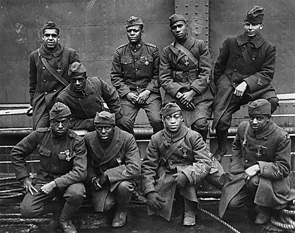 Here is the 369th Infantry Regiment, formerly known as the 15th New York National Guard Regiment, & more commonly referred to as the Harlem Hellfighters. They consisted primarily of black troops that fought in World War I.Their motto was "Don't Tread On Me, God Damn, Let's Go."