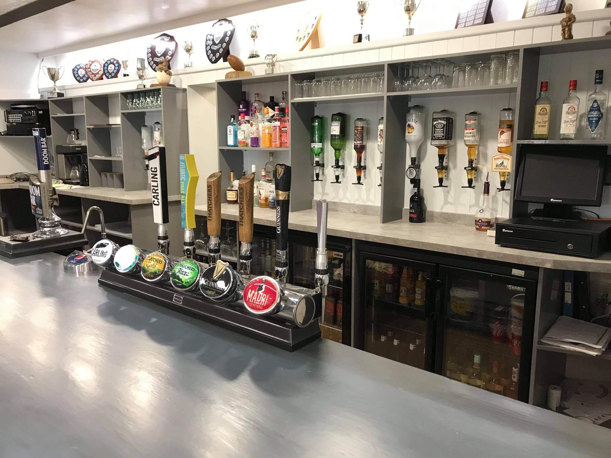 WithycombeRFC's tweet photo. 🍻 Bar Refurb - Finished &amp; looking👌
Massive thanks go to Shaun &amp; Andrea Parkin &amp; Graham Howells for many hours of hard work &amp; @lewis_lv of LV Carpentry for giving his time to fit the new shelving. 
We can’t wait to welcome you back to see it for yourself &amp; sample the new beers! https://t.co/blMuDwv1jU