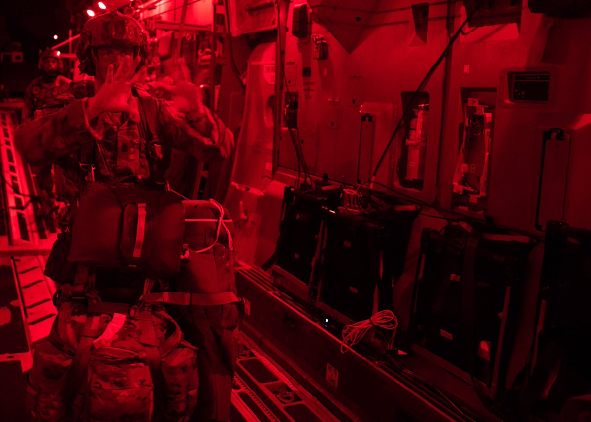 Jumpmasters took their places and began calling their commands: 20-minutes, 10-minutes, get ready, stand up, hook up, check static lines, check equipment and sound off for equipment check.