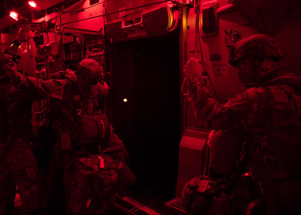 Jumpmasters inspected the paratroop doors to ensure their safety and stick their heads outside of the aircraft to ensure there are no hazards below befor yelling the next commands: one-minute, thirty seconds… stand by.