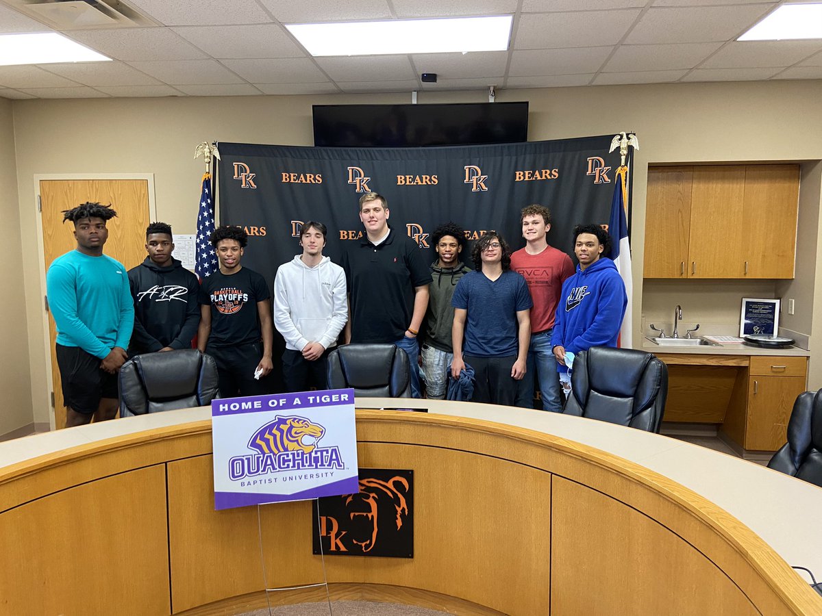 WhittSparks's tweet photo. Signing day with my coaches and senior teammates! @OuachitaFB https://t.co/XQ3h0w9kN2