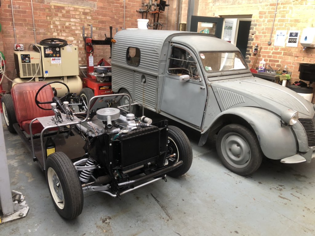 Our restored #triumph training chassis in good company #Citroen #2cv @DrewPritchard @PaulCowland_ #salvagehuntersclassiccars @TheHSAcademy