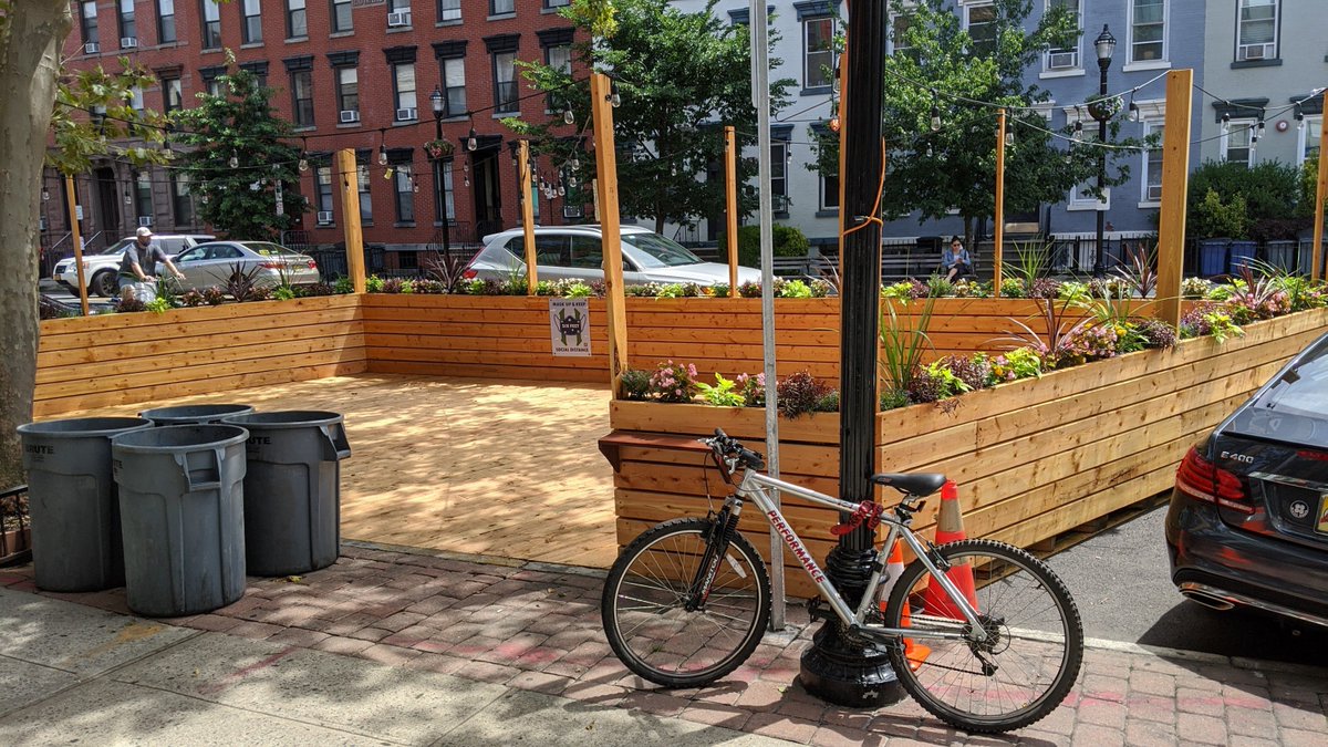When I ask about "first steps", I don't mean dig the street up today.Let's start low cost. Experiment incrementally.Those parklets we have been letting restaurants build (pictured.)Imagine if we built some in residential areas for sitting under a tree with neighbors?