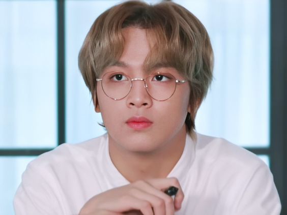 haechan wearing glasses ; a thread